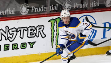 NEWARK, NEW JERSEY - FEBRUARY 20: William Borgen #3 of the Buffalo Sabres takes the puck in the second period against the New Jersey Devils at Prudential Center on February 20, 2021 in Newark, New Jersey. (Photo by Elsa/Getty Images)