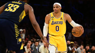 Nov 28, 2022; Los Angeles, California, USA; Los Angeles Lakers guard Russell Westbrook (0) controls the ball against Indiana Pacers center Myles Turner (33) in the second half at Crypto.com Arena. Mandatory Credit: Richard Mackson-USA TODAY Sports