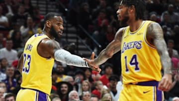 PORTLAND, OR - OCTOBER 18: LeBron James #23 and Brandon Ingram #14 of the Los Angeles Lakers celebrate in the first quarter against the Portland Trail Blazers during their game at Moda Center on October 18, 2018 in Portland, Oregon. NOTE TO USER: User expressly acknowledges and agrees that, by downloading and or using this photograph, User is consenting to the terms and conditions of the Getty Images License Agreement. (Photo by Steve Dykes/Getty Images)