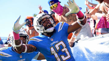 CARSON, CA - OCTOBER 22: Keenan Allen #13 of the Los Angeles Chargers celebrates after Travis Benjamin #12 of the Los Angeles Chargers scores a touchdown making the score 21-0 during the game against the Denver Broncos at the StubHub Center on October 22, 2017 in Carson, California. (Photo by Harry How/Getty Images)