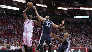 Oct 15, 2016; Houston, TX, USA; Houston Rockets center Nene Hilario (42) grabs a rebound in front of Memphis Grizzlies center Marc Gasol (33) during the second quarter at the Toyota Center. Mandatory Credit: Jerome Miron-USA TODAY Sports