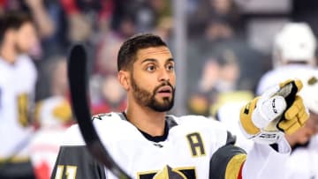 CALGARY, AB - MARCH 10: Vegas Golden Knights Center Pierre-Edouard Bellemare (41) points to the bench during warm ups before an NHL game where the Calgary Flames hosted the Vegas Golden Knights on March 10, 2019, at the Scotiabank Saddledome in Calgary, AB. (Photo by Brett Holmes/Icon Sportswire via Getty Images)