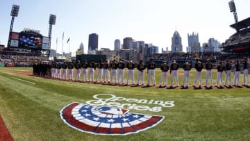 Mar 31, 2014; Pittsburgh, PA, USA; The Pittsburgh Pirates stand for the national anthem prior to the first inning of an opening day baseball game against the Chicago Cubs at PNC Park. Mandatory Credit: Charles LeClaire-USA TODAY Sports