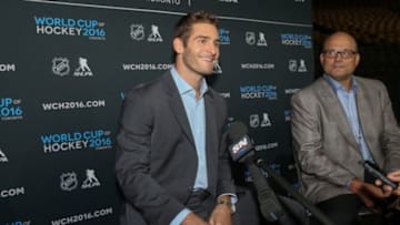 Sep 9, 2015; Toronto, Ontario, Canada; Brandon Saad answers questions from the press as Peter Chiarelli looks on during a press conference and media event for the 2016 World Cup of Hockey at Air Canada Centre. Mandatory Credit: Tom Szczerbowski-USA TODAY Sports