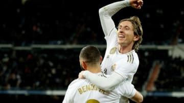 MADRID, SPAIN - NOVEMBER 23: Luka Modric of Real Madrid celebrates 3-1 with Karim Benzema of Real Madrid during the La Liga Santander match between Real Madrid v Real Sociedad at the Santiago Bernabeu on November 23, 2019 in Madrid Spain (Photo by David S. Bustamante/Soccrates/Getty Images)