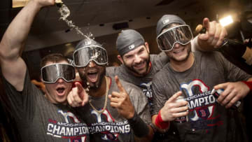 HOUSTON, TX - OCTOBER 18: Brock Holt #12, Eduardo Nunez #36, Mitch Moreland #18, and Andrew Benintendi #16of the Boston Red Sox celebrate with champagne in the clubhouse after clinching the American League Championship Series in game five against the Houston Astros on October 18, 2018 at Minute Maid Park in Houston, Texas. (Photo by Billie Weiss/Boston Red Sox/Getty Images)