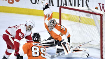 Mar 15, 2016; Philadelphia, PA, USA; Philadelphia Flyers goalie Steve Mason (35) makes a save against Detroit Red Wings left wing Henrik Zetterberg (40) during the third period at Wells Fargo Center. The Flyers defeated the Red Wings, 4-3. Mandatory Credit: Eric Hartline-USA TODAY Sports