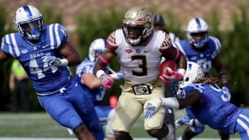 DURHAM, NC - OCTOBER 14: Jeremy McDuffie #9 of the Duke Blue Devils tries to stop Cam Akers #3 of the Florida State Seminoles during their game at Wallace Wade Stadium on October 14, 2017 in Durham, North Carolina. (Photo by Streeter Lecka/Getty Images)
