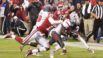 Oct 26, 2013; Norman, OK, USA; Texas Tech Red Raiders wide receiver Jakeem Grant (11) scores a touchdown against Oklahoma Sooners during the third quarter at Gaylord Family - Oklahoma Memorial Stadium. Oklahoma won 38-30. Mandatory Credit: Alonzo Adams-USA TODAY Sports