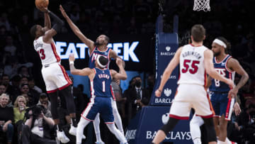 Bam Adebayo #13 of the Miami Heat shoots against Kevin Durant #7 and Bruce Brown #1 of the Brooklyn Nets(Photo by Michelle Farsi/Getty Images)