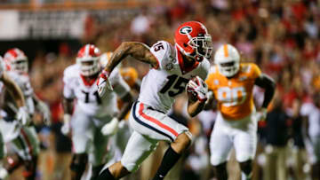 KNOXVILLE, TENNESSEE - OCTOBER 05: Lawrence Cager #15 of the Georgia Bulldogs runs with the ball after making a catch during the second quarter of the game against the Tennessee Volunteers at Neyland Stadium on October 05, 2019 in Knoxville, Tennessee. (Photo by Silas Walker/Getty Images)