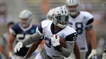 Aug 1, 2016; Irvine, CA, USA; Dallas Cowboys running back Ezekiel Elliott (21) carries the ball at training camp at the River Ridge Fields. Mandatory Credit: Kirby Lee-USA TODAY Sports