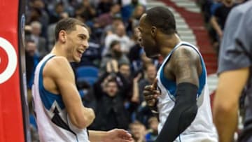 Jan 12, 2016; Minneapolis, MN, USA; Minnesota Timberwolves guard Zach LaVine (8) celebrates with forward Shabazz Muhammad (15) during the fourth quarter against the Oklahoma City Thunder at Target Center. The Thunder defeated the Timberwolves 101-96. Mandatory Credit: Brace Hemmelgarn-USA TODAY Sports