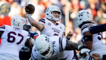 Mississippi State quarterback Will Rogers (2) passes against Auburn football during Saturday's game.