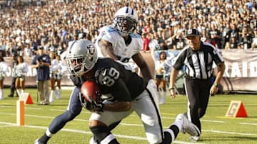 Aug 27, 2016; Oakland, CA, USA; Oakland Raiders wide receiver Amari Cooper (89) catches a touchdown in front of Tennessee Titans cornerback Jason McCourty (30) in the second quarter at Oakland Alameda Coliseum. Mandatory Credit: Cary Edmondson-USA TODAY Sports