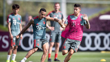 DOHA, QATAR - JANUARY 08: Thiago is challenged by James Rodriguez during a training session at day five of the Bayern Muenchen training camp at Aspire Academy on January 07, 2019 in Doha, Qatar. (Photo by Lars Baron/Bongarts/Getty Images)