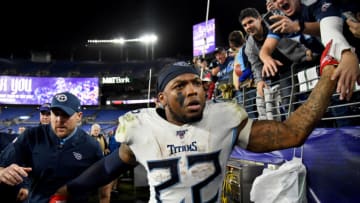 BALTIMORE, MARYLAND - JANUARY 11: Derrick Henry #22 of the Tennessee Titans celebrates with fans after defeating the Baltimore Ravens in the AFC Divisional Playoff game at M&T Bank Stadium on January 11, 2020 in Baltimore, Maryland. (Photo by Will Newton/Getty Images)