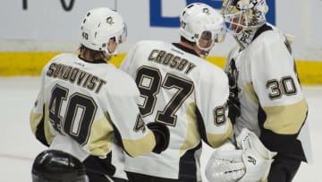 Apr 5, 2016; Ottawa, Ontario, CAN; Pittsburgh Penguins (center Sidney Crosby (87) congratulates goalie Matthew Murray (30) following their win against the Ottawa Senators at the Canadian Tire Centre. The Penguins defeated the Senators 5-3. Mandatory Credit: Marc DesRosiers-USA TODAY Sports