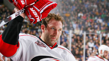 BUFFALO, NY - MARCH 15: Erik Cole #26 of the Carolina Hurricanes watches the action against the Buffalo Sabres at HSBC Arena on March 15, 2011 in Buffalo, New York. (Photo by Bill Wippert/NHLI via Getty Images)