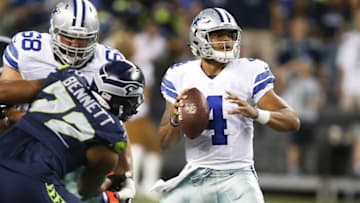 Aug 25, 2016; Seattle, WA, USA; Dallas Cowboys quarterback Dak Prescott (4) looks to pass against the Seattle Seahawks during the second quarter at CenturyLink Field. Seattle defeated Dallas, 27-17. Mandatory Credit: Joe Nicholson-USA TODAY Sports