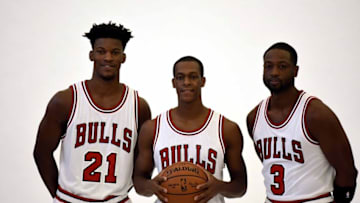 Sep 26, 2016; Chicago, IL, USA; Chicago Bulls guard Jimmy Butler (21) guard Rajon Rondo (9) and guard Dwayne Wade (3) pose for a photo during Bulls media day at The Advocate Center. Mandatory Credit: David Banks-USA TODAY Sports