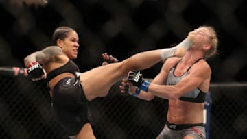 LAS VEGAS, NV - JULY 06: Amanda Nunes of Brazil kicks Holly Holm in their UFC bantamweight championship fight during the UFC 239 event at T-Mobile Arena on July 6, 2019 in Las Vegas, Nevada. (Photo by Christian Petersen/Zuffa LLC/Zuffa LLC)