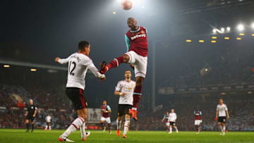 LONDON, ENGLAND - MAY 10: Diafra Sakho of West Ham United and Chris Smalling of Manchester United battle for the ball during the Barclays Premier League match between West Ham United and Manchester United at the Boleyn Ground on May 10, 2016 in London, England. West Ham United are playing their last ever home match at the Boleyn Ground after their 112 year stay at the stadium. The Hammers will move to the Olympic Stadium for the 2016-17 season. (Photo by Paul Gilham/Getty Images)