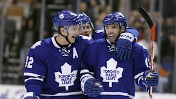 Mar 24, 2016; Toronto, Ontario, CAN; Toronto Maple Leafs forward Tyler Bozak (42) and forward William Nylander (39) and forward Nazem Kadri (43) celebrate a win over the Anaheim Ducks at the Air Canada Centre. Toronto defeated Anaheim 6-5 in overtime. Mandatory Credit: John E. Sokolowski-USA TODAY Sports