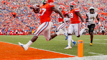 GAINESVILLE, FLORIDA - SEPTEMBER 28: Dameon Pierce #27 of the Florida Gators scores a touchdown during the third quarter against the Towson Tigers at Ben Hill Griffin Stadium on September 28, 2019 in Gainesville, Florida. (Photo by James Gilbert/Getty Images)