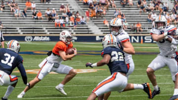 Auburn football quarterback Bo Nix (10) scrambles around the pocket during Auburn football A-Day spring game at Jordan-Hare Stadium in Auburn, Ala., on Saturday, April 17, 2021.