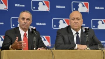 Dec 7, 2015; Nashville, TN, USA; MLB commissioner Rob Manfred answers question from the media after naming Cal Ripken Jr. (right) Senior Advisor to the Commissioner on Youth Programs and Outreach during the MLB winter meetings at Gaylord Opryland Resort . Mandatory Credit: Jim Brown-USA TODAY Sports