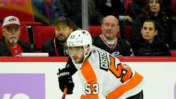 RALEIGH, NC - NOVEMBER 21: Shayne Gostisbehere #53 of the Philadelphia Flyers controls the puck along the boards during an NHL game against the Carolina Hurricanes on November 21, 2019 at PNC Arena in Raleigh, North Carolina. (Photo by Gregg Forwerck/NHLI via Getty Images)