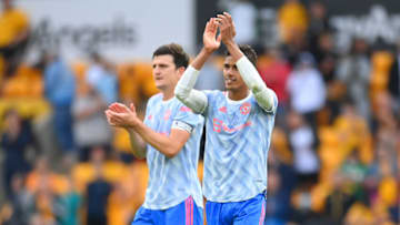 WOLVERHAMPTON, ENGLAND - AUGUST 29: Raphael Varane and Harry Maguire look on after the Premier League match between Wolverhampton Wanderers and Manchester United at Molineux on August 29, 2021 in Wolverhampton, England. (Photo by Michael Regan/Getty Images)