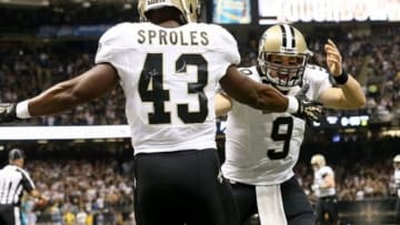 Sep 30, 2013; New Orleans, LA, USA; New Orleans Saints quarterback Drew Brees (9) congratulates running back Darren Sproles (43) after a touchdown against the Miami Dolphins in the second quarter at Mercedes-Benz Superdome. Mandatory Credit: Crystal LoGiudice-USA TODAY Sports