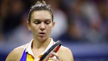 NEW YORK, NY - AUGUST 28: Simona Halep of Romania reacts against Maria Sharapova of Russia during her first round Women's Singles match on Day One of the 2017 US Open at the USTA Billie Jean King National Tennis Center on August 28, 2017 in the Flushing neighborhood of the Queens borough of New York City. (Photo by Clive Brunskill/Getty Images)