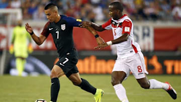 Sep 6, 2016; Jacksonville, FL, USA; United States forward Bobby Wood (7) dribbles the ball in the first half as Trinidad & Tobago midfielder Khaleem Hyland (8) defends at EverBank Field. Mandatory Credit: Logan Bowles-USA TODAY Sports
