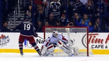 Jan 2, 2016; Columbus, OH, USA; Columbus Blue Jackets center Ryan Johansen (19) scores the game winning goal during the shootout against Washington Capitals goalie Braden Holtby (70) at Nationwide Arena.Columbus defeated Washington 5-4 in a shootout. Mandatory Credit: Russell LaBounty-USA TODAY Sports
