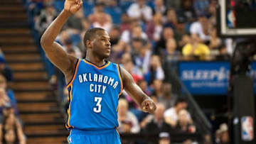 Feb 29, 2016; Sacramento, CA, USA; Oklahoma City Thunder guard Dion Waiters (3) signals a three pointer after scoring against the Sacramento Kings during the second quarter at Sleep Train Arena. Mandatory Credit: Ed Szczepanski-USA TODAY Sports
