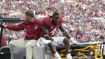 Oct 22, 2016; Tuscaloosa, AL, USA; Alabama Crimson Tide defensive back Eddie Jackson (4) is carted off the field after being injured against Texas A&M Aggies at Bryant-Denny Stadium. Mandatory Credit: Marvin Gentry-USA TODAY Sports