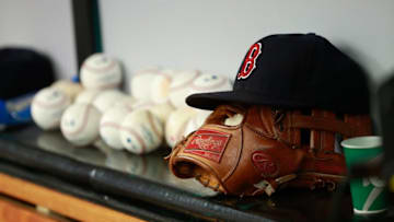 Jun 28, 2015; St. Petersburg, FL, USA; Boston Red Sox hat and glove lay in the dugout against the Tampa Bay Rays at Tropicana Field. Mandatory Credit: Kim Klement-USA TODAY Sports