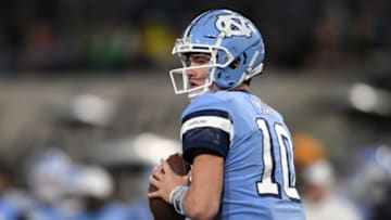 Dec 28, 2022; San Diego, CA, USA; North Carolina Tar Heels quarterback Drake Maye (10) looks to pass against the Oregon Ducks during the first quarter of the 2022 Holiday Bowl at Petco Park. Mandatory Credit: Orlando Ramirez-USA TODAY Sports