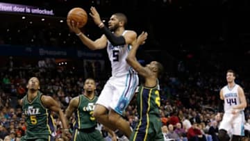 Jan 18, 2016; Charlotte, NC, USA; Charlotte Hornets guard Nicolas Batum (5) goes up for a shot against the Utah Jazz in the first half at Time Warner Cable Arena. Mandatory Credit: Jeremy Brevard-USA TODAY Sports