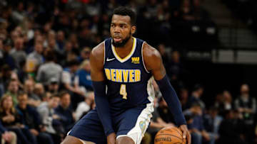 MINNEAPOLIS, MN - APRIL 11: Paul Millsap #4 of the Denver Nuggets dribbles the ball against the Minnesota Timberwolves during the game on April 11, 2018 at the Target Center in Minneapolis, Minnesota. The Timberwolves defeated the Nuggets 112-106. NOTE TO USER: User expressly acknowledges and agrees that, by downloading and or using this Photograph, user is consenting to the terms and conditions of the Getty Images License Agreement. (Photo by Hannah Foslien/Getty Images)