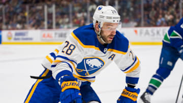 Oct 22, 2022; Vancouver, British Columbia, CAN; Buffalo Sabres forward Zemgus Girgensons (28) skates after the loose puck against the Vancouver Canucks in the second period at Rogers Arena. Mandatory Credit: Bob Frid-USA TODAY Sports