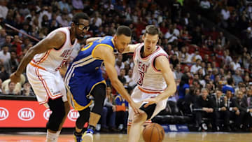 Feb 24, 2016; Miami, FL, USA; Miami Heat guard Goran Dragic (7) steals the ball away from Golden State Warriors guard Stephen Curry (30) during the first half at American Airlines Arena. Mandatory Credit: Steve Mitchell-USA TODAY Sports