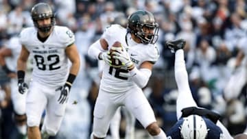 Nov 26, 2016; University Park, PA, USA; Michigan State Spartans wide receiver R.J. Shelton (12) runs with the ball during the first quarter against the Penn State Nittany Lions at Beaver Stadium. Penn State defeated Michigan State 45-12. Mandatory Credit: Matthew O
