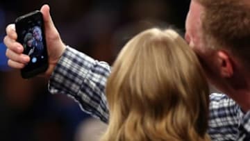 Oct 29, 2014; New York, NY, USA; Musical artist Taylor Swift (left) takes a selfie with actor Michael Rappaport (right) during half time of the Chicago Bulls against the New York Knicks at Madison Square Garden. Mandatory Credit: Adam Hunger-USA TODAY Sports