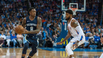 OKLAHOMA CITY, OK - APRIL 11: Memphis Grizzlies Forward MarShon Brooks (8) looking to pass while Oklahoma City Thunder Forward Paul George (13) plays defense on April 11, 2018 at Chesapeake Energy Arena in Oklahoma City, Oklahoma. (Photo by Torrey Purvey/Icon Sportswire via Getty Images)