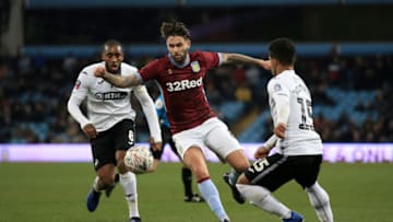 BIRMINGHAM, ENGLAND - JANUARY 05: Henri Lansbury of Aston Villa battles for possession with Leroy Fer of Swansea City and Wayne Routledge of Swansea City during the FA Cup Third Round match between Aston Villa and Swansea City at Villa Park on January 5, 2019 in Birmingham, United Kingdom. (Photo by Marc Atkins/Getty Images)