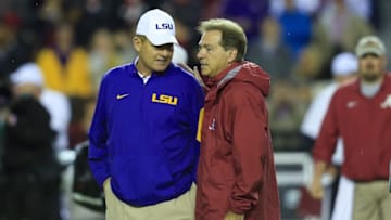 Nov 7, 2015; Tuscaloosa, AL, USA; Alabama Crimson Tide head coach Nick Saban and LSU Tigers head coach Les Miles greet each other prior to the game at Bryant-Denny Stadium. Mandatory Credit: Marvin Gentry-USA TODAY Sports